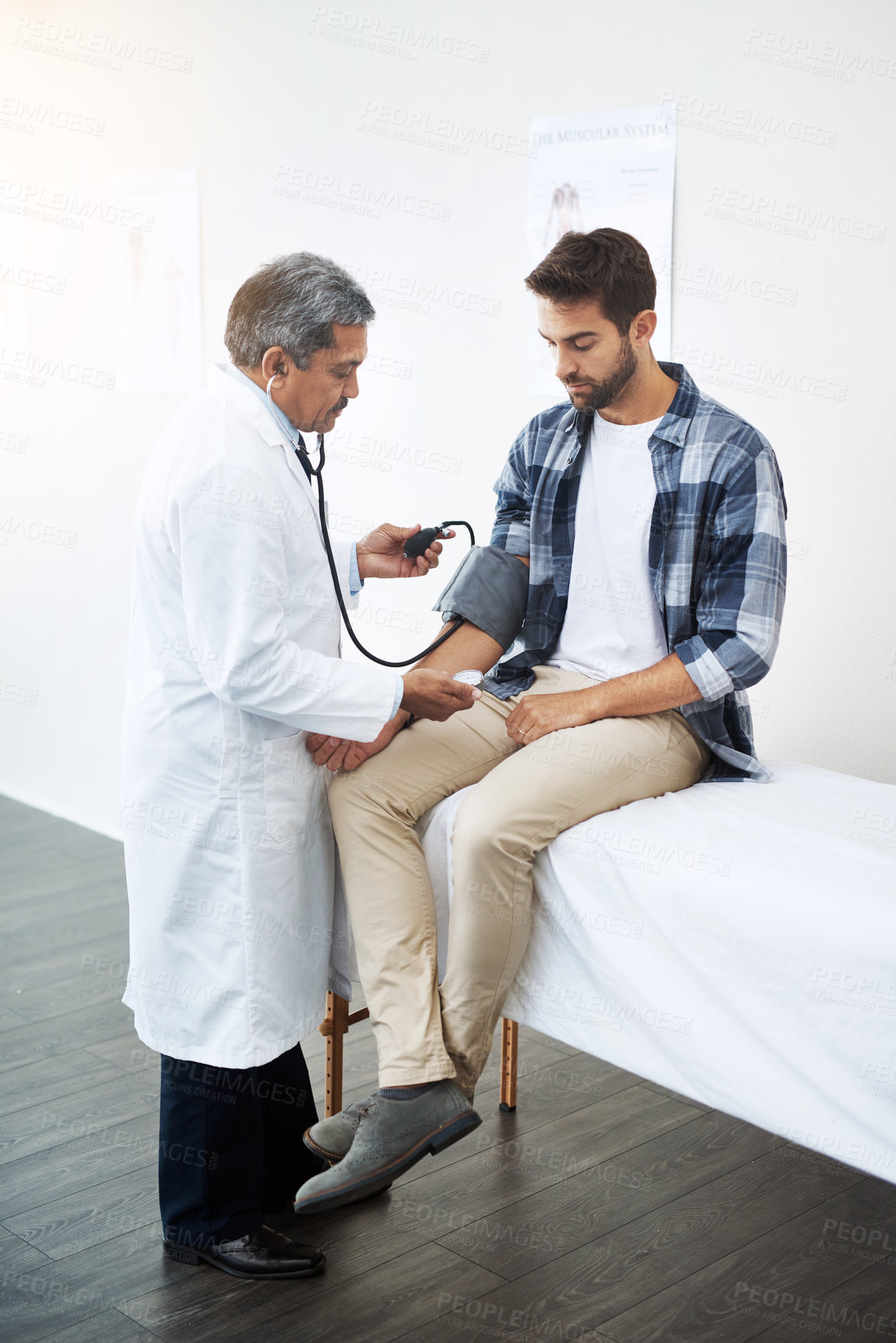 Buy stock photo Men, doctor and patient with sphygmomanometer for checkup, consultation and healthcare at hospital. People, stethoscope and clinic for exam, checkup and support with help for high blood and pulse