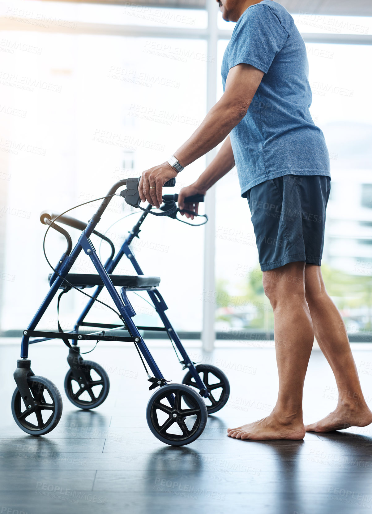 Buy stock photo Physiotherapy, senior man and walker for balance, elderly care or wellness for health or fitness. Pensioner, male person and rollator for support, walking and mobility in rehab clinic or consultation