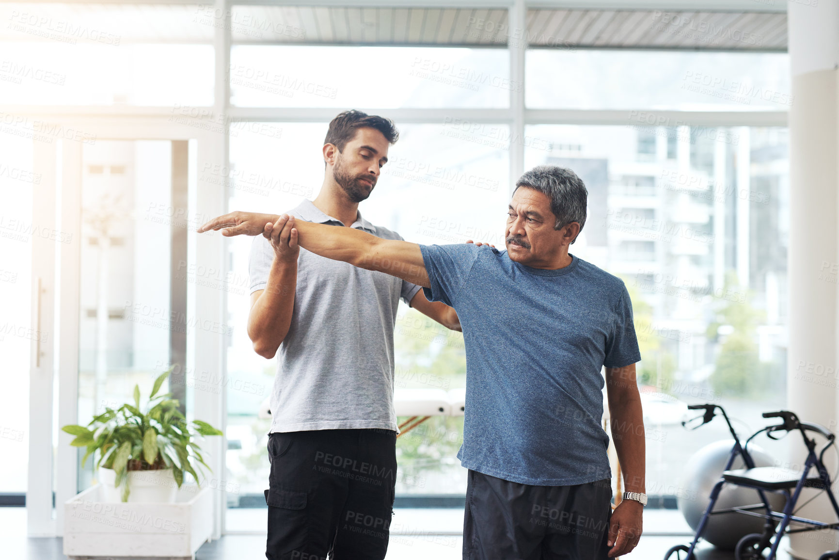 Buy stock photo Physiotherapy, stretching and arm with old man and doctor for training, rehabilitation and injury. Medical, healing and healthcare with expert and patient for consulting, help and fitness