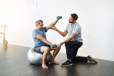 Buy stock photo Weights, physiotherapy and help with doctor and old man for rehabilitation, training or stretching. Healthcare, wellness and healing with patient and physiotherapist for consulting, muscle or balance