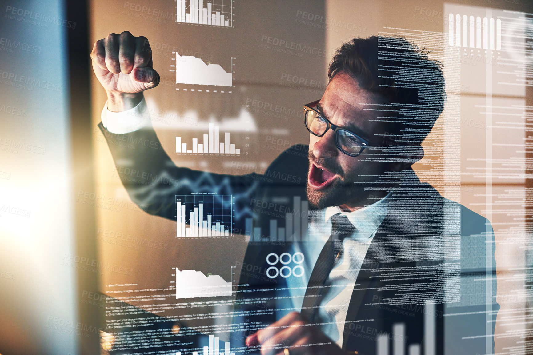 Buy stock photo Cropped shot of a handsome young businessman cheering while coding late in the office