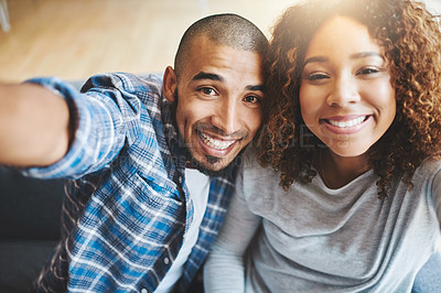 Buy stock photo Happy couple taking selfies as home owners, bonding or enjoying new real estate purchase. Portrait of smiling or proud man and woman celebrating and capturing memory picture as home investors
