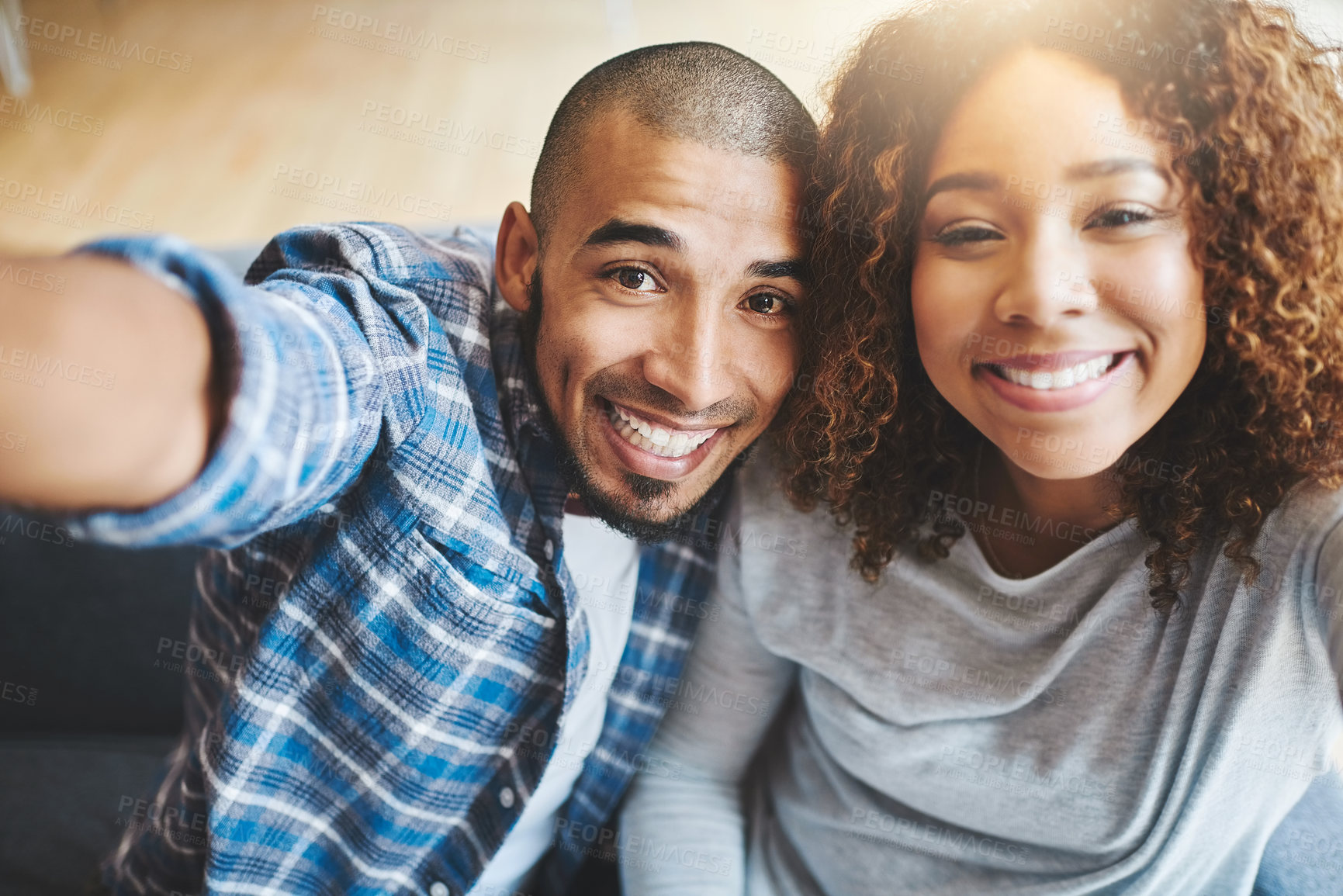 Buy stock photo Happy couple taking selfies as home owners, bonding or enjoying new real estate purchase. Portrait of smiling or proud man and woman celebrating and capturing memory picture as home investors