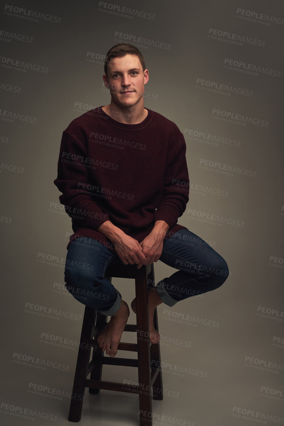 Buy stock photo Fashion, chair and portrait of man in studio with casual, cool clothes and stylish outfit. Happy, relaxing and isolated person sitting with confidence, pride and aesthetic by gray background