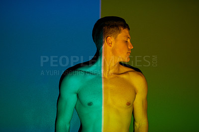 Buy stock photo Neon, body and light in studio for model, fitness and muscle with health, abstract and skin as man. Male person, shirtless and colorful aesthetic for wellness, strong and exercise with thinking idea