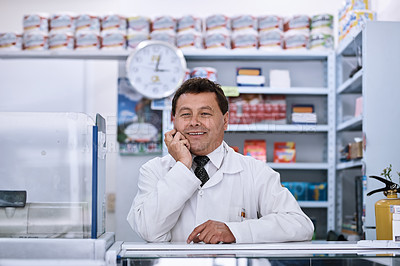 Buy stock photo Portrait of a male pharmacist in a pharmacy