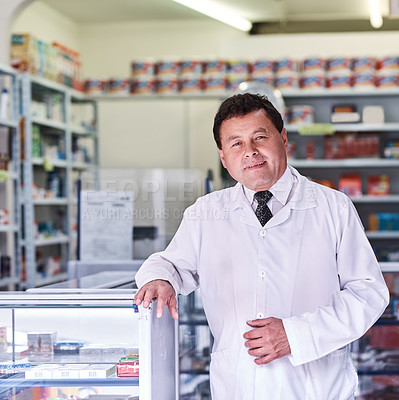 Buy stock photo Portrait of a male pharmacist in a pharmacy