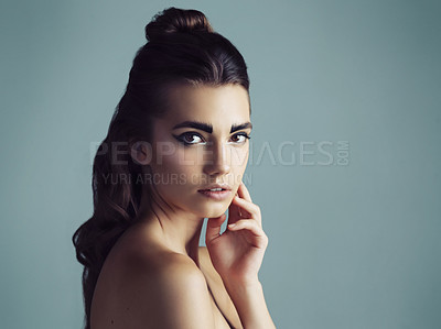 Buy stock photo Studio shot of an attractive young woman wearing artistic makeup
