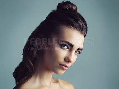 Buy stock photo Studio shot of an attractive young woman wearing artistic makeup