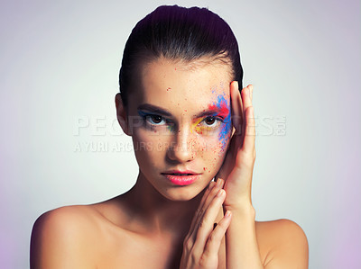 Buy stock photo Portrait, paint and beauty of woman in makeup isolated on studio background. Creative, art and face of confident young model with color cosmetics for skincare, fantasy and glow on abstract aesthetic