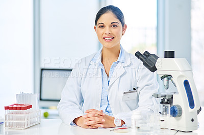 Buy stock photo Portrait of a young scientist working in a lab