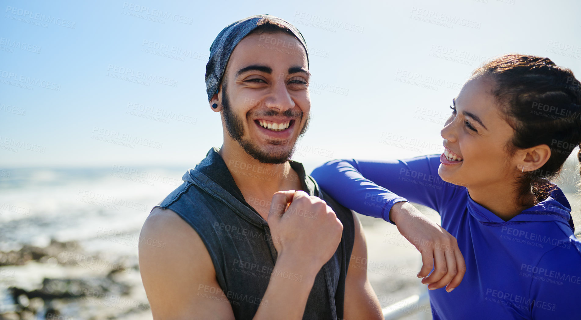 Buy stock photo Man, woman and happy for fitness by ocean, promenade and outdoor for portrait, partner or coach in summer. People, runner and couple of friends by sea for exercise, workout and excited in Colombia