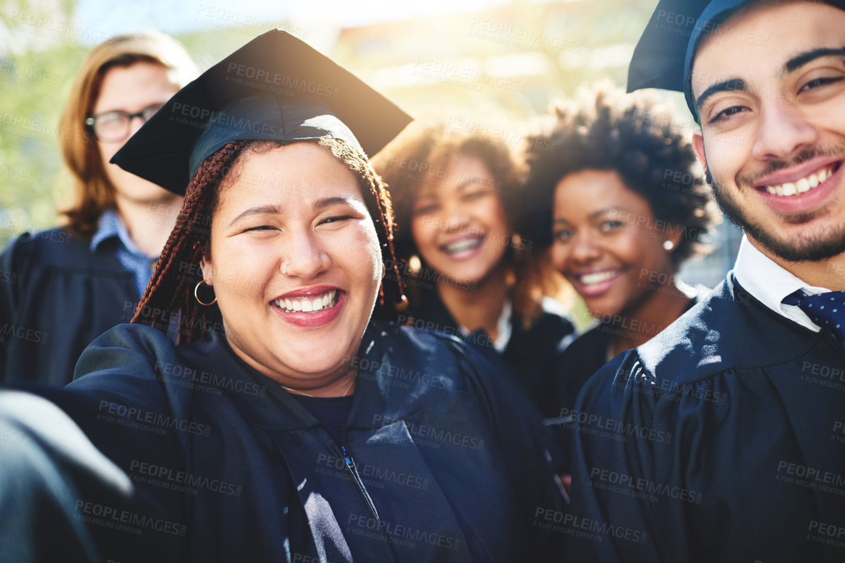 Buy stock photo Cropped shot of a group of students taking a selfie together