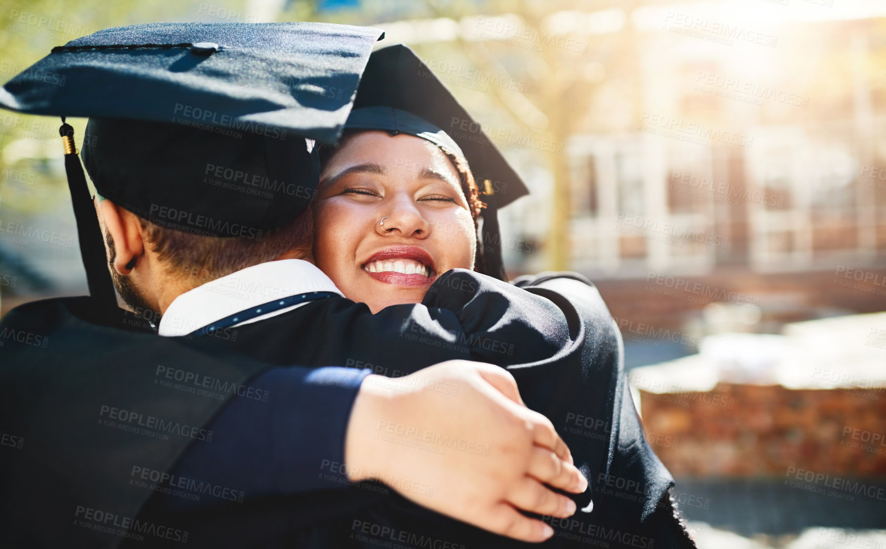 Buy stock photo Happy woman, students and graduation with hug for achievement, milestone or future together at university. Young female person, friends or graduate with smile for embrace, accomplishment or support