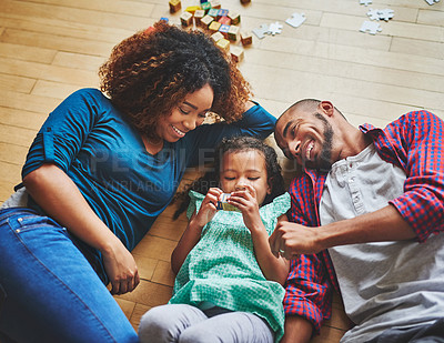 Buy stock photo Cropped shot of a family of three spending quality time together