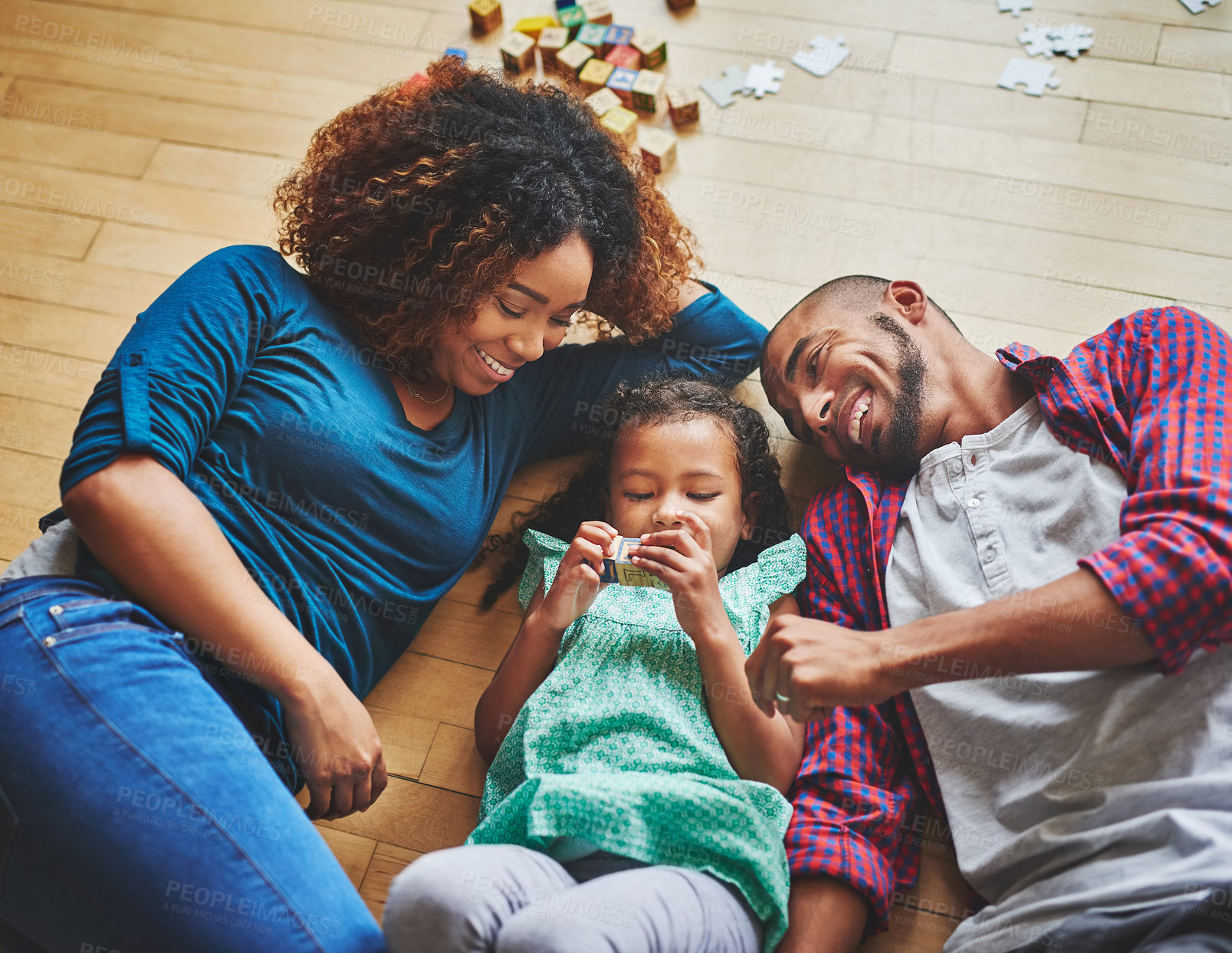 Buy stock photo Cropped shot of a family of three spending quality time together