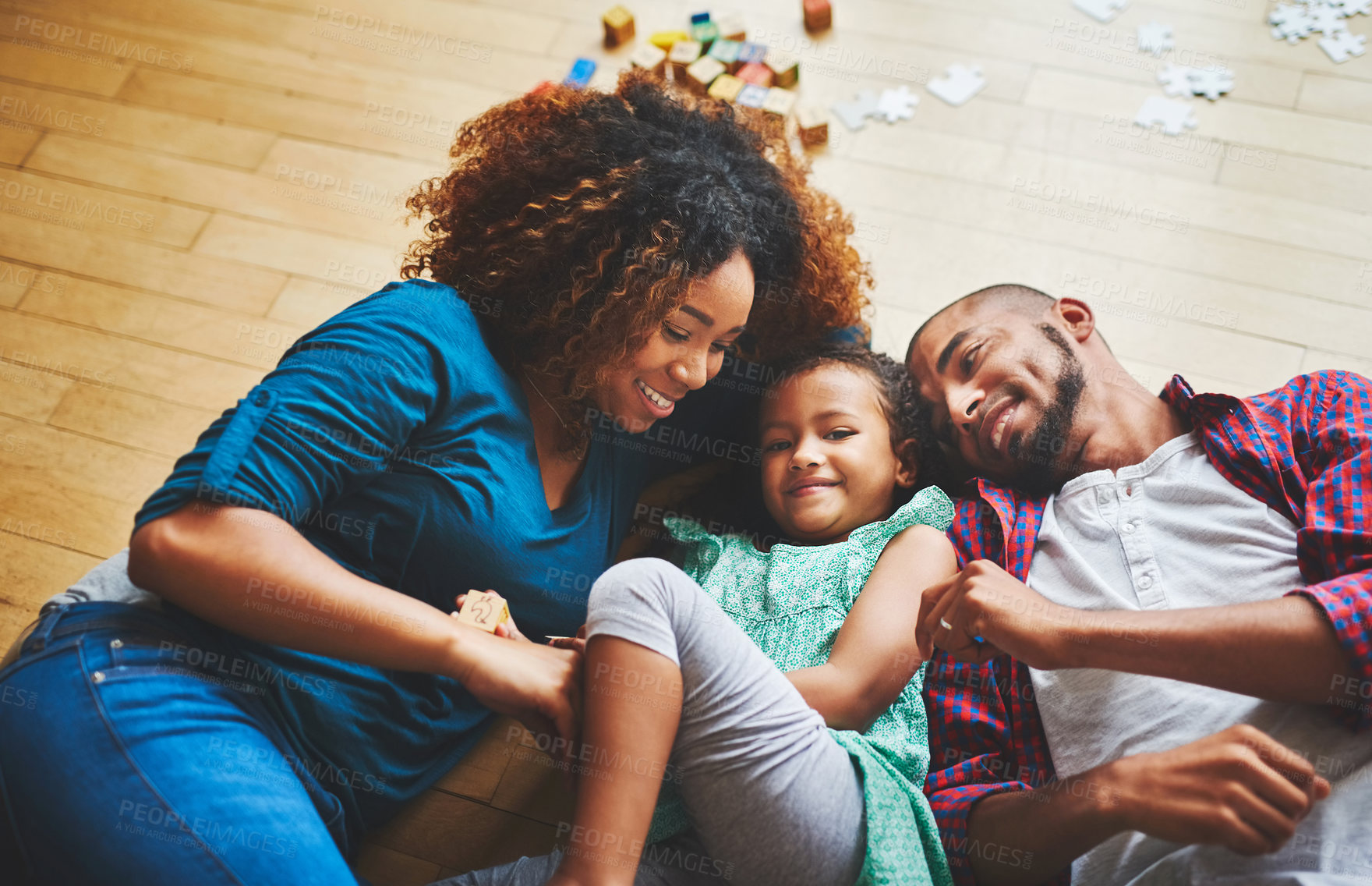 Buy stock photo Cropped shot of a family of three spending quality time together