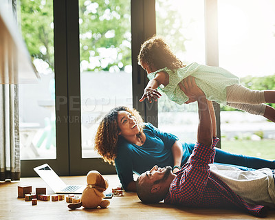 Buy stock photo Cropped shot of a family of three spending quality time together
