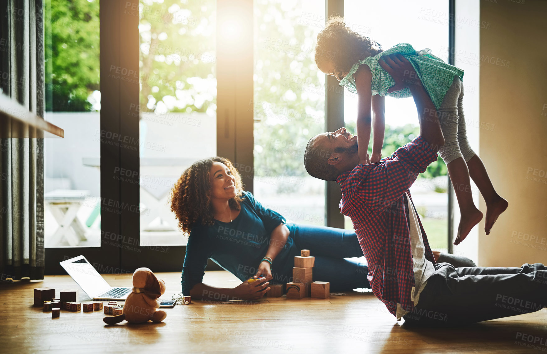 Buy stock photo Cropped shot of a family of three spending quality time together