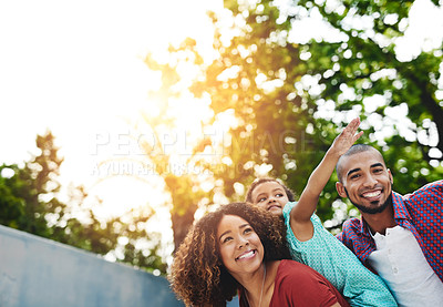 Buy stock photo Happy family, piggyback and bonding with daughter in nature for playing, freedom or outdoor fun. Father, mother and child or little girl with smile in sunshine for holiday, weekend or hug in backyard