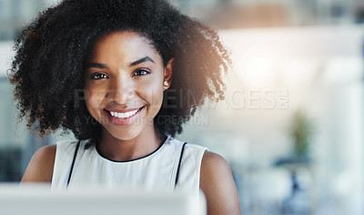 Buy stock photo Cropped shot of an attractive young businesswoman working in her office