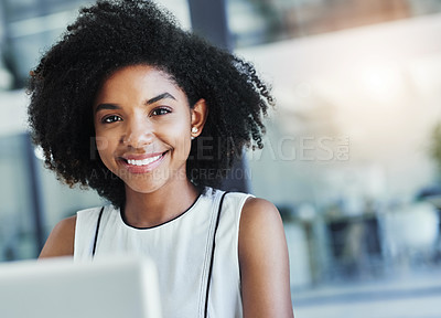 Buy stock photo Cropped shot of an attractive young businesswoman working in her office