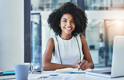 Buy stock photo Cropped shot of an attractive young businesswoman working in her office