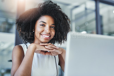 Buy stock photo Cropped shot of an attractive young businesswoman in her office