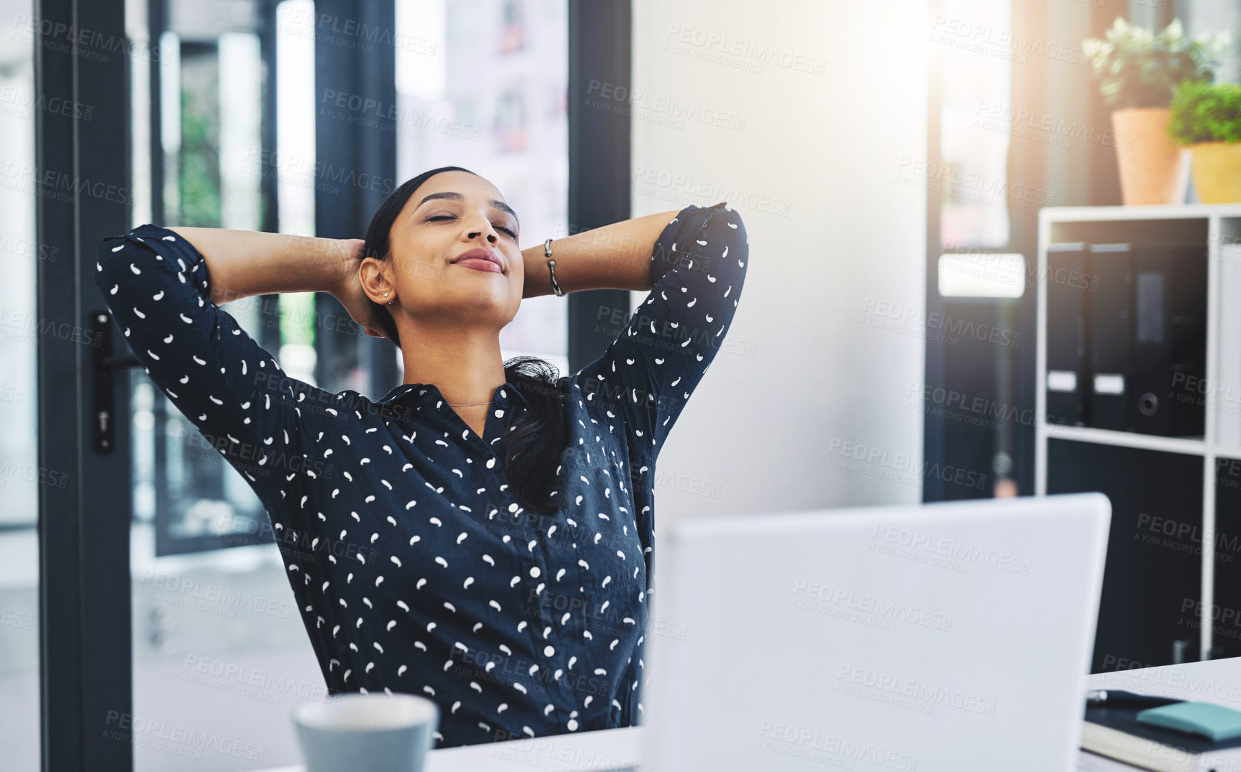 Buy stock photo Cropped shot of an attractive young businesswoman in her office 