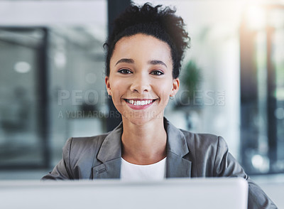 Buy stock photo Cropped shot of an attractive young businesswoman in her office 