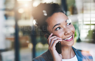 Buy stock photo Cropped shot of an attractive young businesswoman on a call in her office