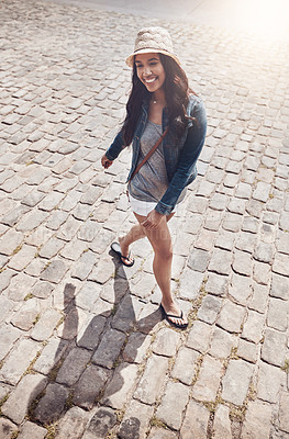 Buy stock photo Shot of a beautiful young woman spending her day in the city