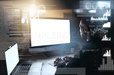 Buy stock photo Cropped shot of a young male hacker cracking a computer code in the dark