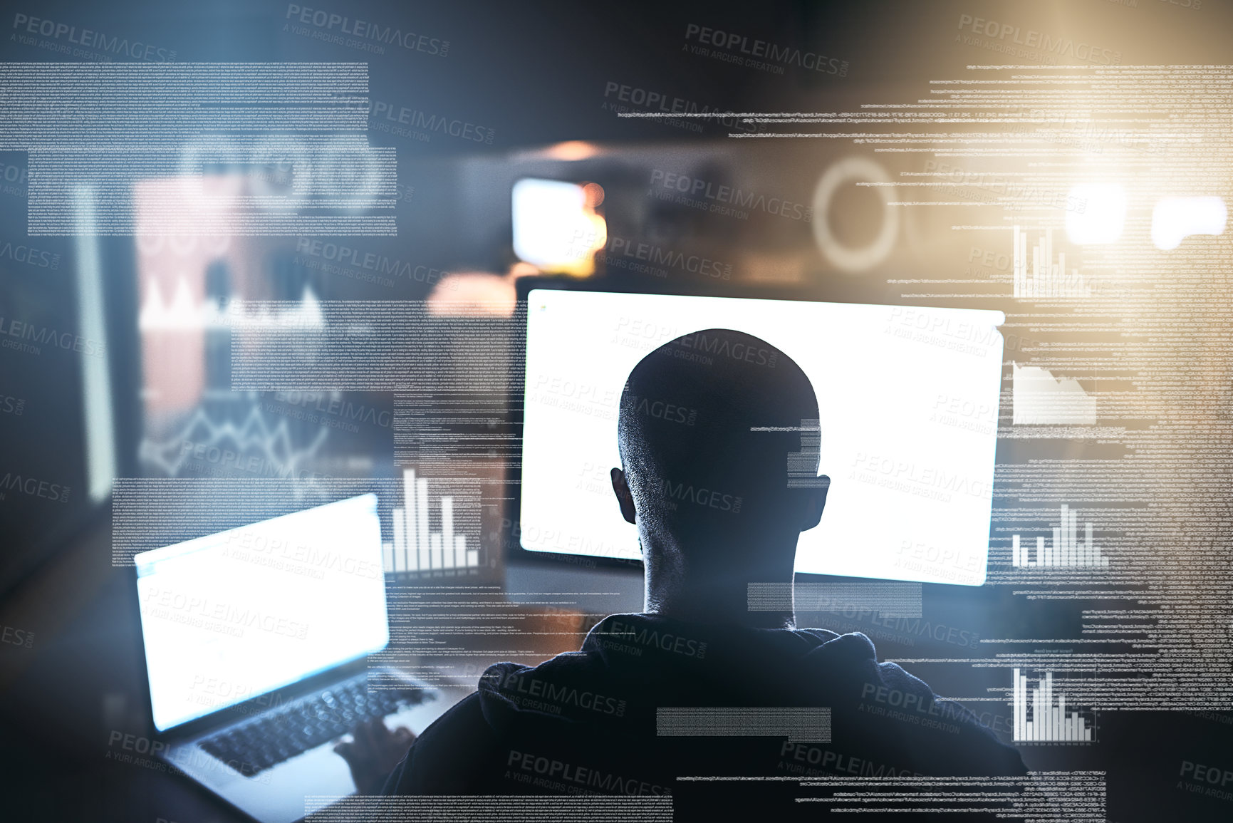 Buy stock photo Rearview shot of a young male hacker cracking a computer code in the dark