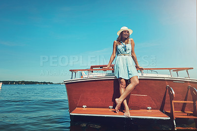 Buy stock photo Blue sky, standing and woman with smile on boat for travel, vacation or holiday by ocean with adventure. Happy, explore and person with hat on deck of yacht by sea for summer weekend trip in Italy.