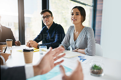Buy stock photo Business people, meeting and discussion for team planning, analysis or brainstorming ideas at the office. Group of employee workers in conversation, teamwork or collaboration for corporate goals