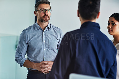 Buy stock photo Business people, team and meeting in discussion for idea, strategy or marketing plan at the office. Group of employee workers in business meeting, conversation or collaboration at the workplace
