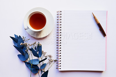 Buy stock photo Studio shot of a diary and pen placed with other still life objects against a grey background