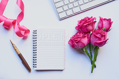 Buy stock photo Studio shot of a diary and pen placed with other still life objects against a grey background