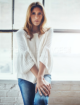 Buy stock photo Portrait, woman and casual fashion in lounge, house or apartment for relax, calm or peace on weekend. Female person, stylish and trendy in home for wellness or self care in clothing, jeans or sweater