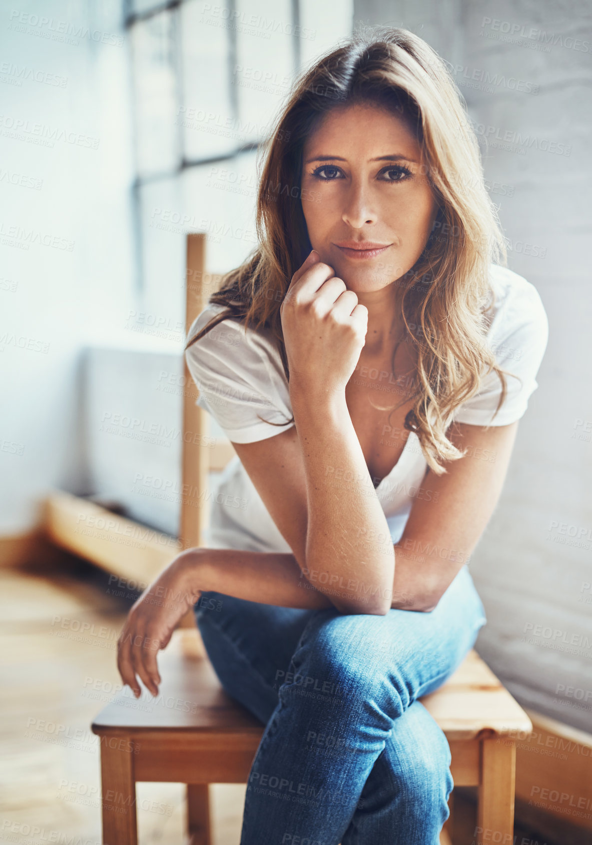 Buy stock photo Woman, portrait and serious or relax at house with peace, comfort and carefree for harmony in lounge. Pensive, female person and rest on weekend break for calm, chair and living room at home