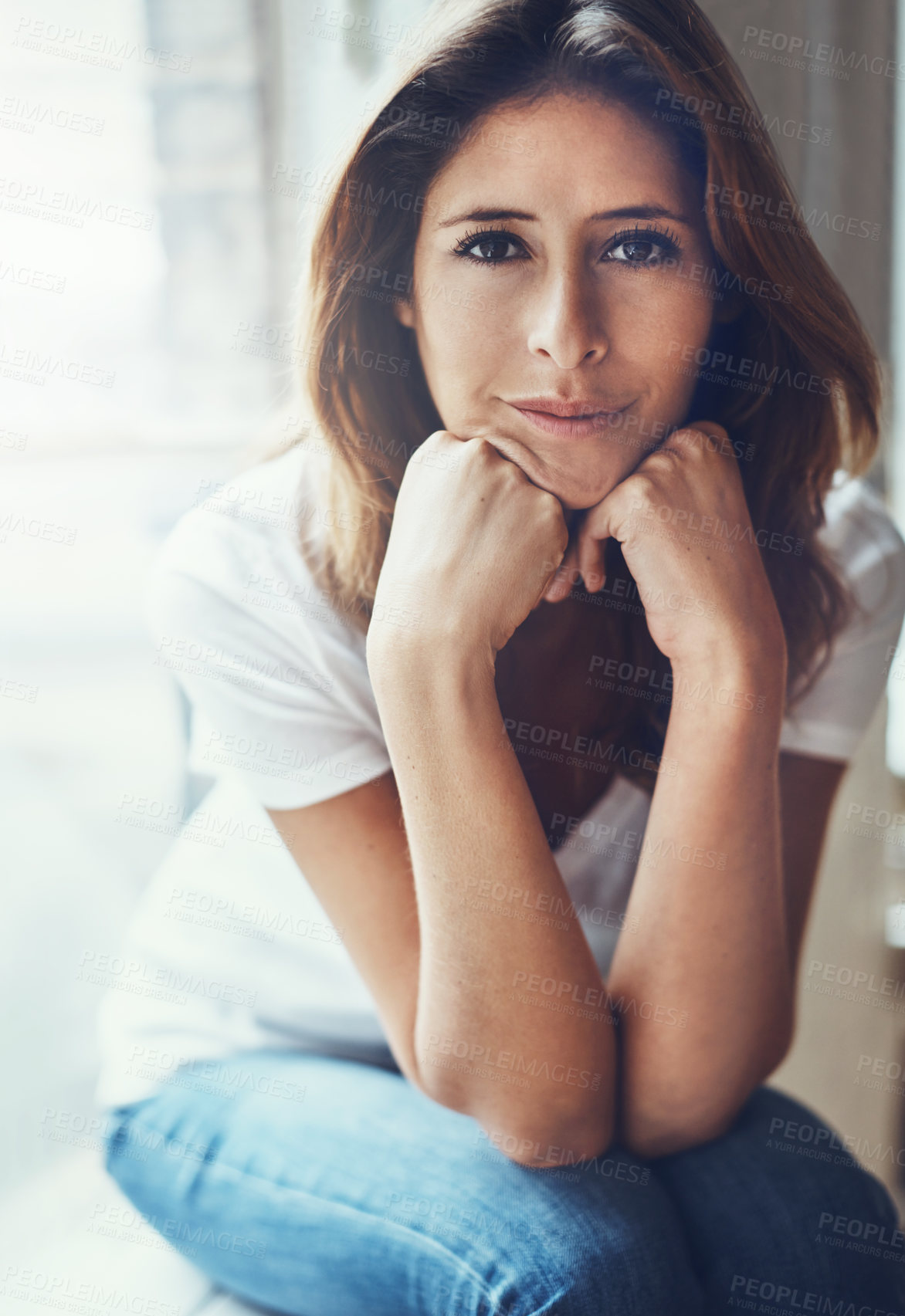 Buy stock photo Portrait of an attractive young woman relaxing at home