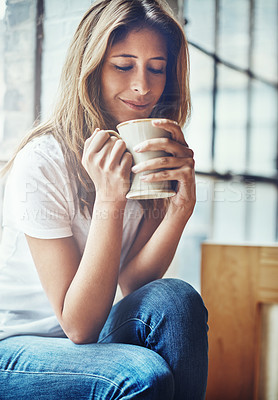 Buy stock photo Calm, coffee and woman smelling the aroma while relaxing in her home on a weekend morning. Happy, relax and female from Columbia smell the caffeine scent while enjoying a hot drink in her house.