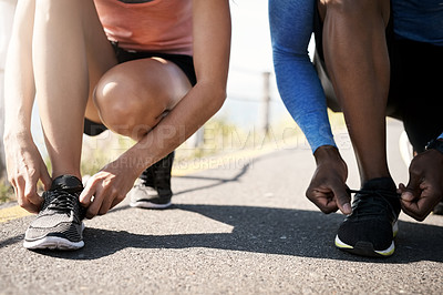 Buy stock photo People, outdoor and hands for fitness with shoelaces on road for running, exercise and workout. Closeup, asphalt and street for jogging with training or cardio for health, wellness and self care