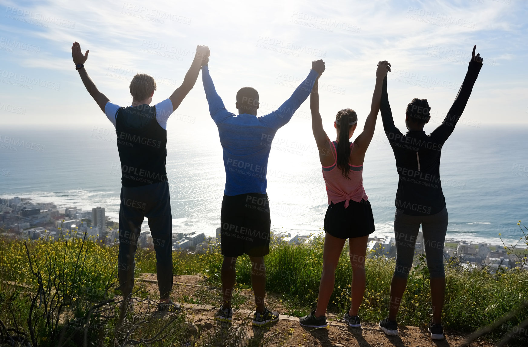 Buy stock photo People, back and celebration with hiking on mountain or hill as victory on summit for exercise. Group, freedom and excited for workout, running club and sports team for outdoor adventure or training