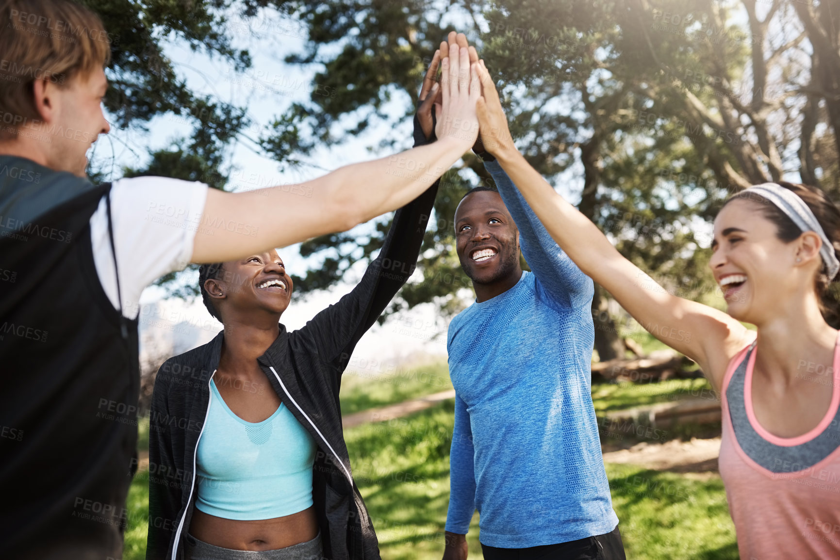 Buy stock photo Fitness, couple of friends and high five at park for exercise with unity, celebration and solidarity. People, outdoor and happy or smile with huddle at forest in support for health and self care 