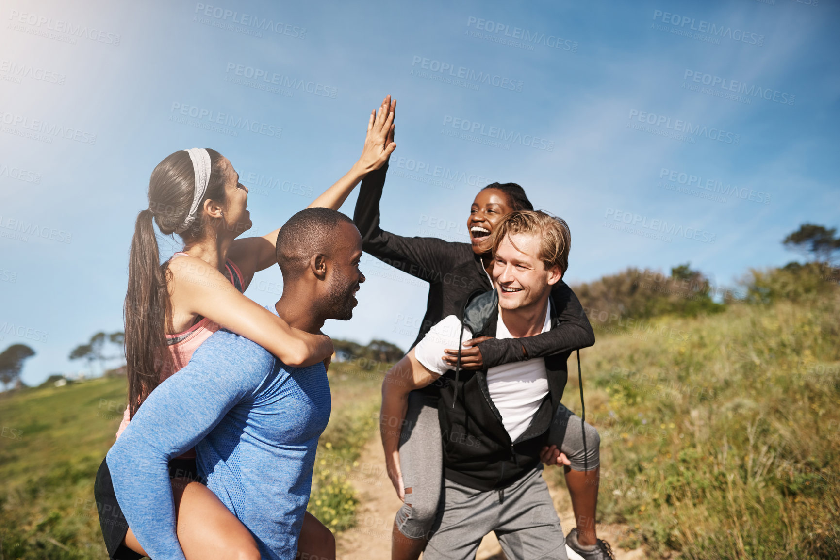 Buy stock photo High five, fitness or couple of friends outdoor to celebrate workout goal, success or win. Piggyback, excited group or people together with hands for sports achievement, body health or team in nature