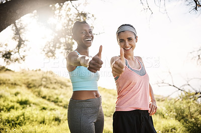 Buy stock photo Interracial women, portrait and fitness with thumbs up in nature for good workout, exercise or training together. Young, female people or friends with smile, like emoji or yes sign for outdoor hiking