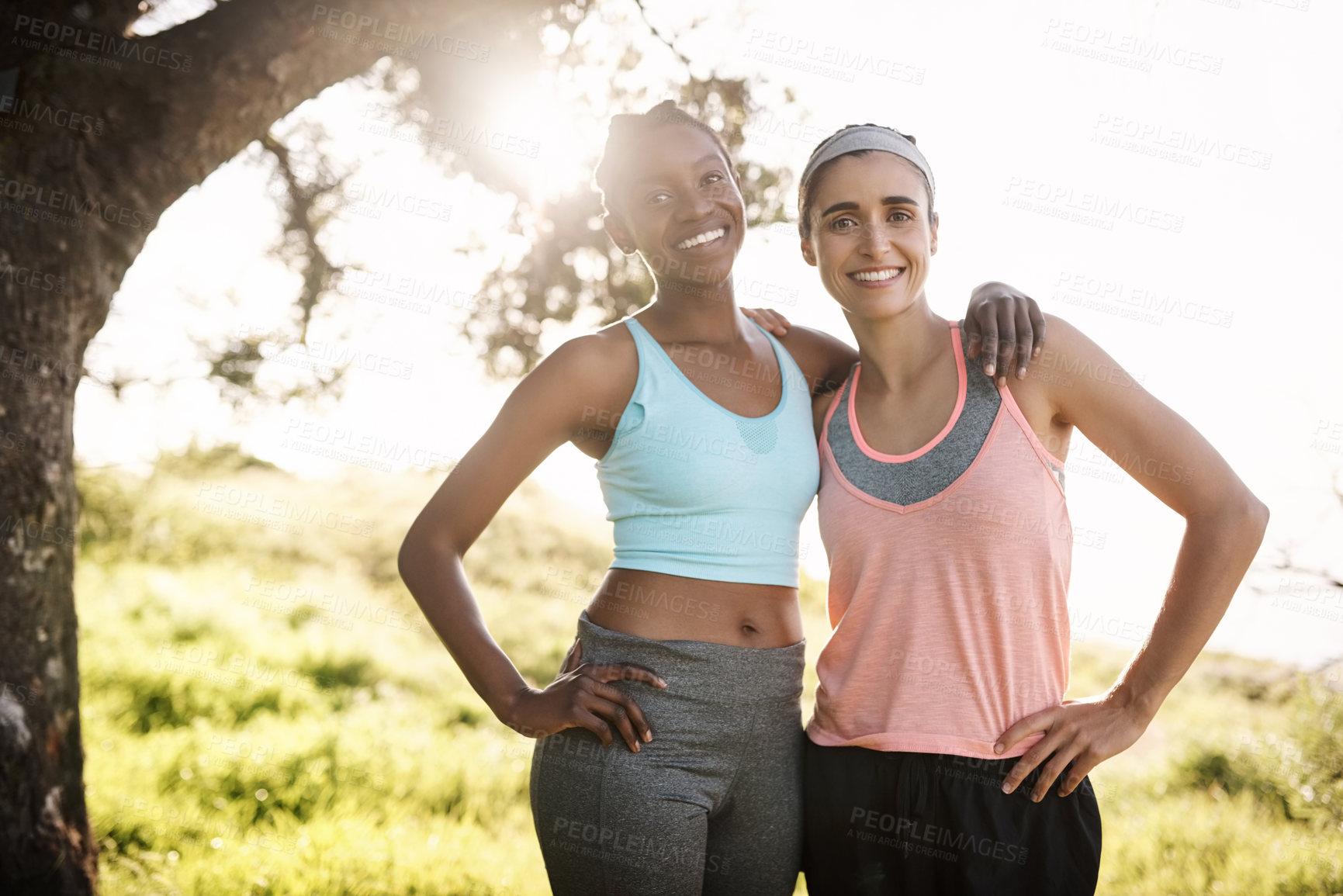 Buy stock photo Shot of two friends out exercising together