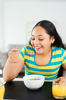 Buy stock photo Home, healthy breakfast and girl with cereal, nutrition and wellness with food and orange juice. Start day, kid eating and hungry child in house, meal and morning juice with smile and dining room